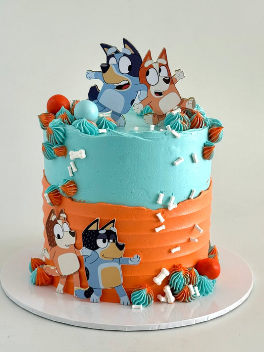 Cake with bluey character figures on a white background