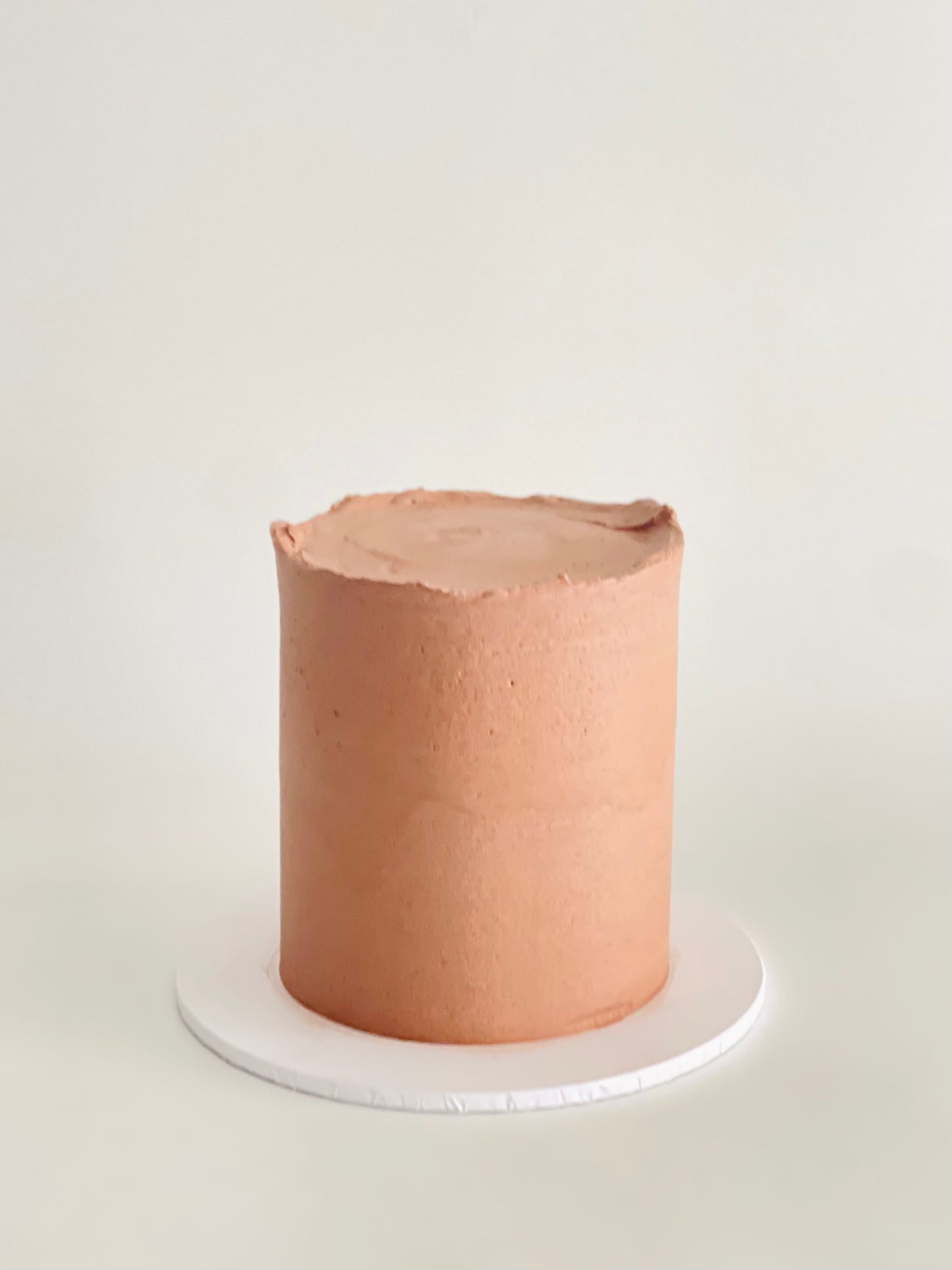 plain iced cake in chocolate to decorate on your own