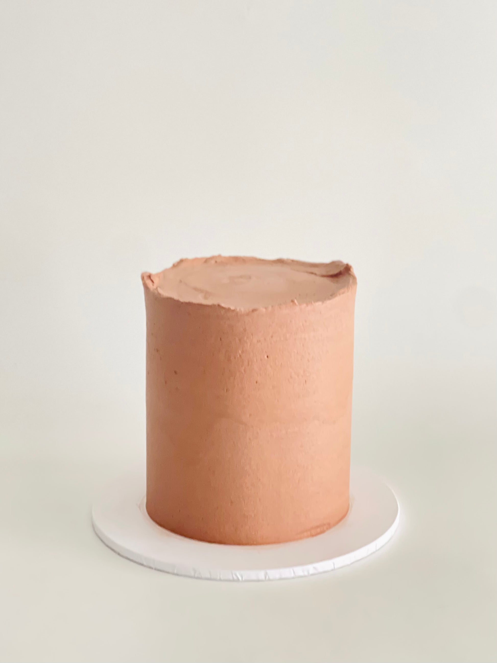 plain iced cake in chocolate to decorate on your own