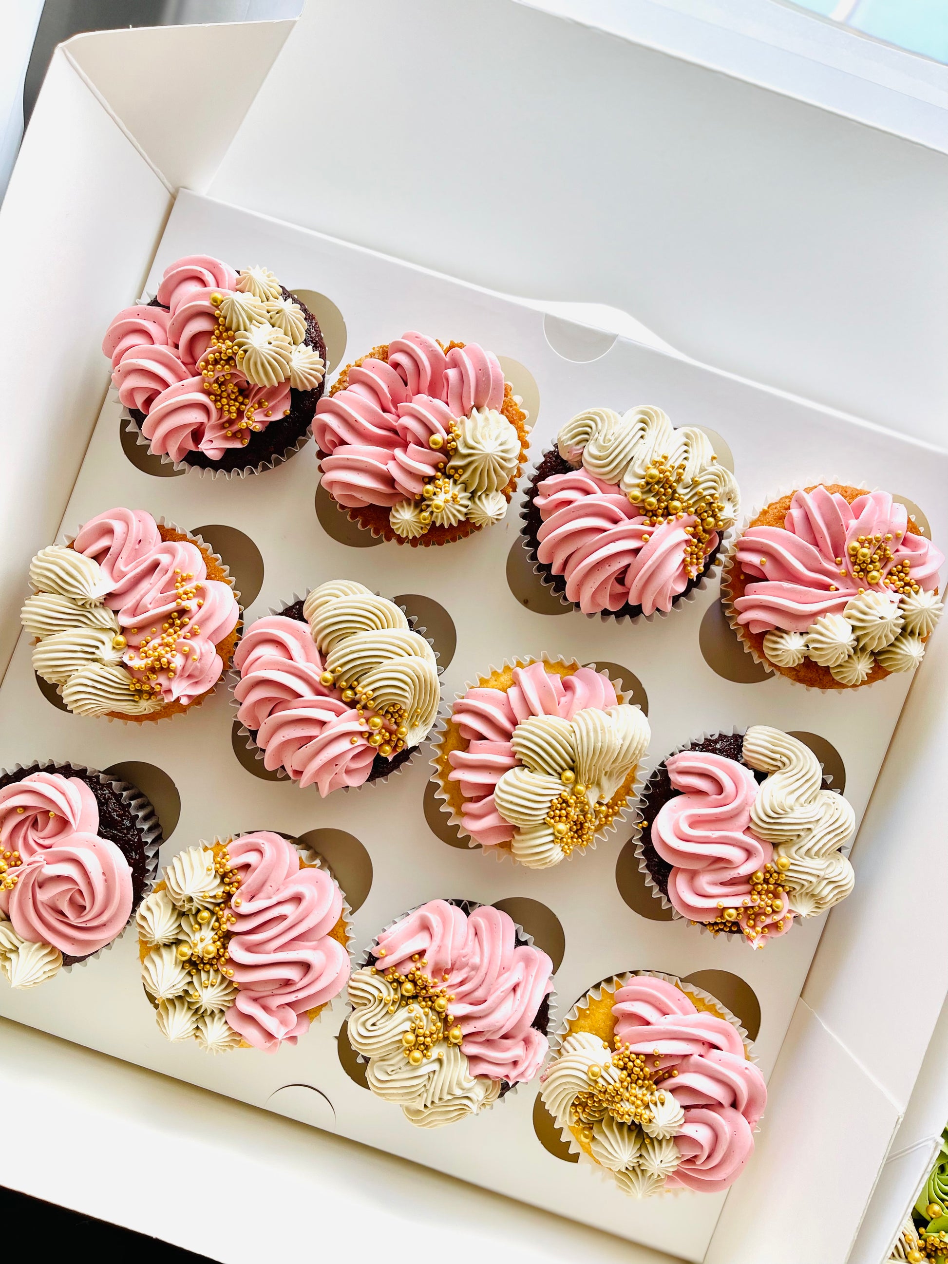 Elegantly piped pretty cupcakes with delivery options