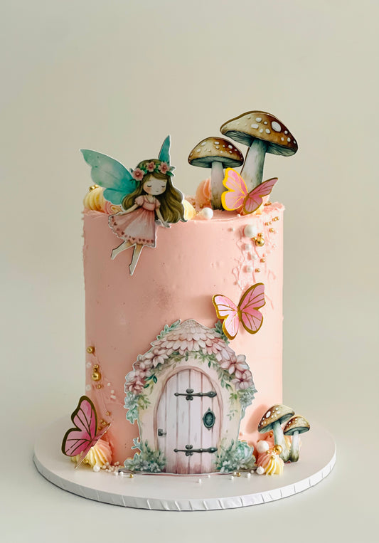 pretty and elegant fairy theme cake