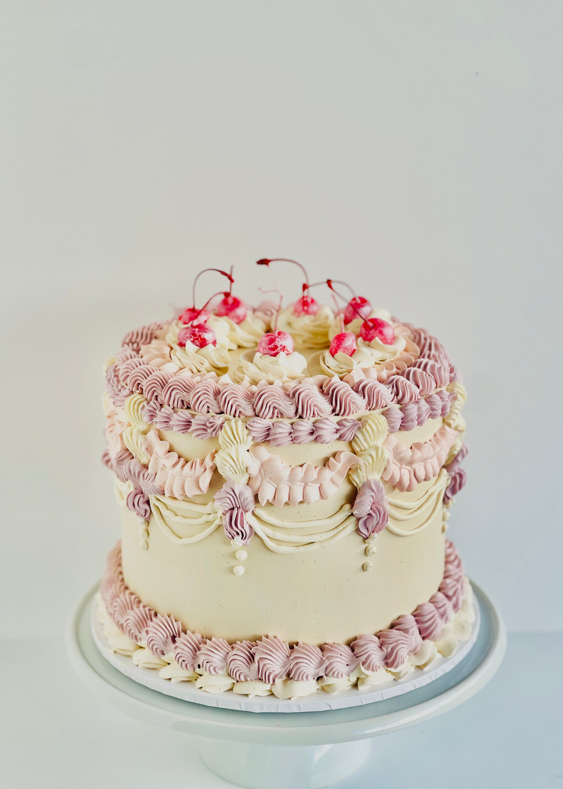 Vintage style cute cake with cherries