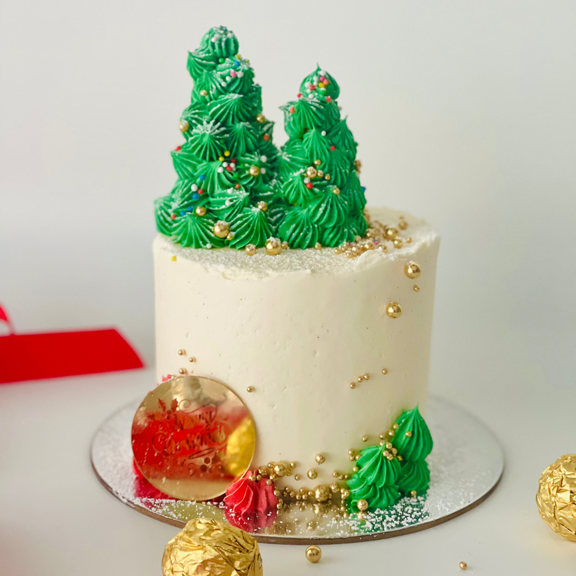 Christmas theme cake with trees & sprinkle of snow