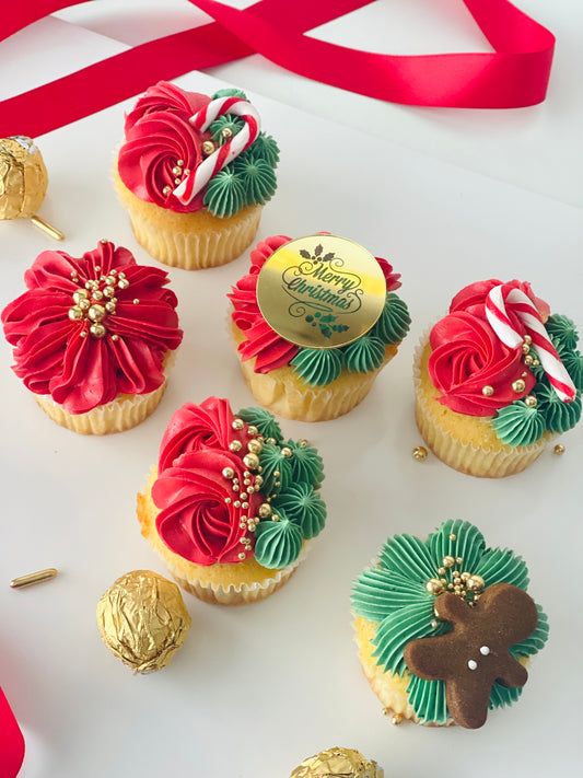 pretty with swirls in red & green with golden sprinkles, candy cane, gingerbread man and Merry Christmas token